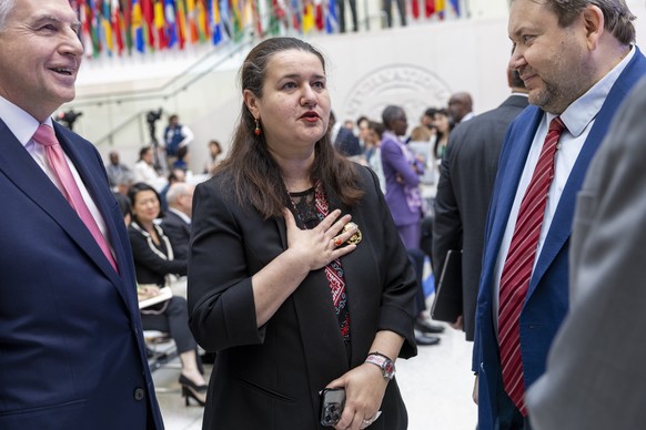 epa12037163 Ukrainian Ambassador to the US Oksana Markarova (C) prior to IMF Managing Director Kristalina Georgieva&#039;s 2025 Spring Meetings&#039; Curtain Raiser Speech at the IMF headquarters in W ...