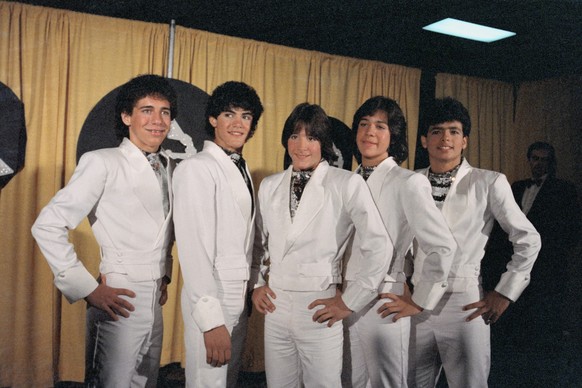 Ricky Melendez, Charlie Masso, Roy Rosello, Rey Reyes, and Robi Rosa of Menudo present award for &quot;Best Recording for Children&quot; at the 1984 Grammy Awards.