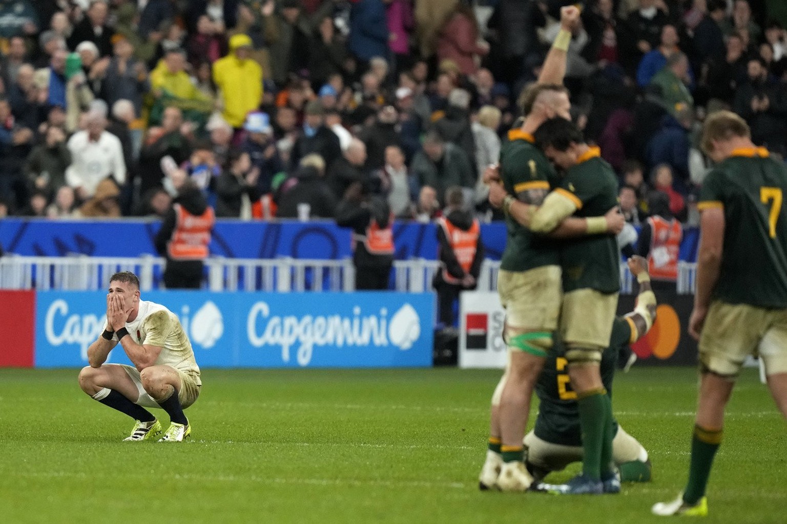 England&#039;s Freddie Steward, left, reacts after the Rugby World Cup semifinal match between England and South Africa at the Stade de France in Saint-Denis, outside Paris, Saturday, Oct. 21, 2023. ( ...