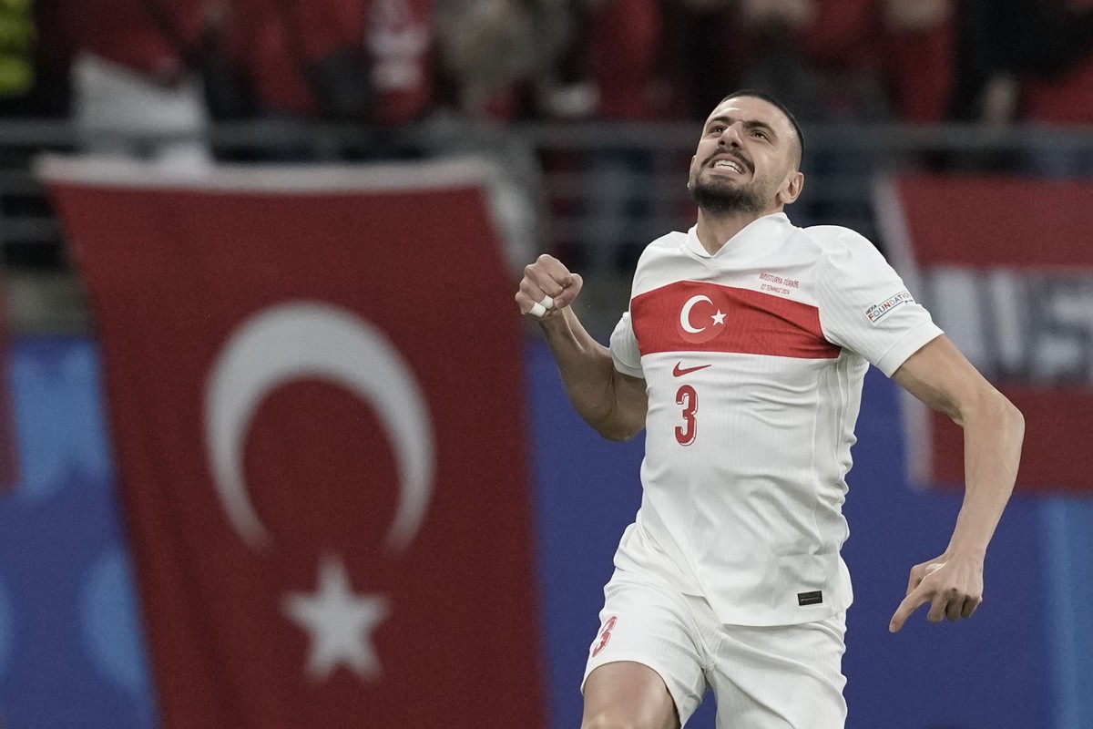 Turkey's Merih Demiral celebrates scoring his side's opening goal against Austria during a round of sixteen match at the Euro 2024 soccer tournament in Leipzig, Germany, Tuesday, July 2, 202 ...