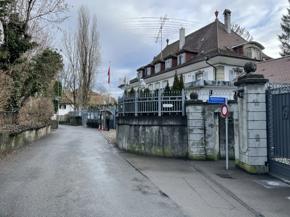 Chinese Embassy on Kalcheggweg in Bern, guarded and guarded by security guards and numerous cameras.