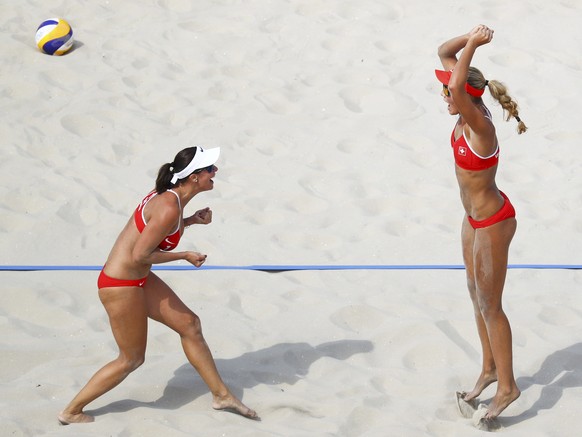 2016 Rio Olympics - Beach Volleyball - Women&#039;s Preliminary - Beach Volleyball Arena - Rio de Janeiro, Brazil - 08/08/2016. Anouk Verge-Depre (SUI) of Switzerland and Isabelle Forrer (SUI) of Swit ...