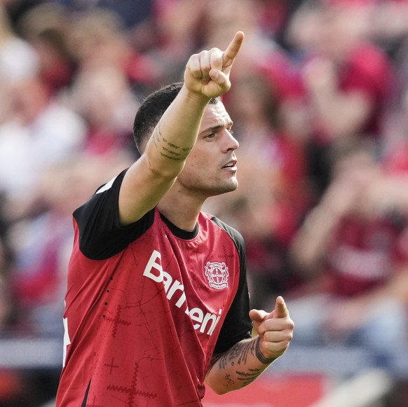 Leverkusen&#039;s Granit Xhaka gestures during the German Bundesliga soccer match between Bayer Leverkusen and FC Augsburg at the BayArena in Leverkusen, Germany, Saturday, April 26, 2025. (AP Photo/M ...