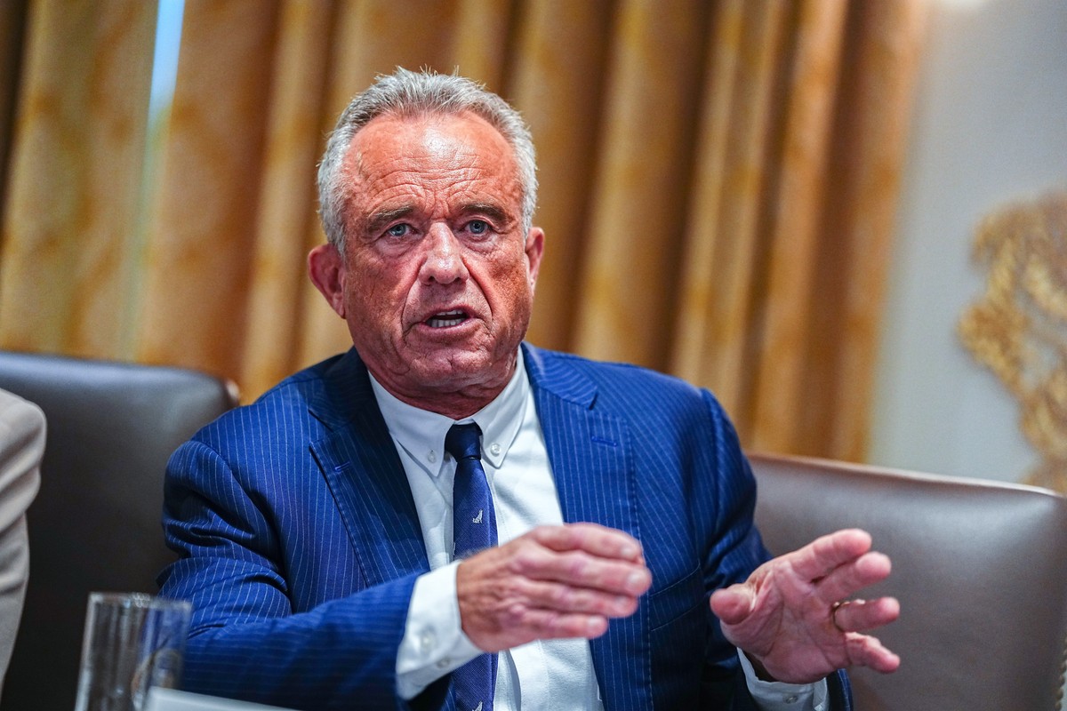 epa12324529 United States Secretary of Health and Human Services Robert F. Kennedy, Jr speaks as US President Donald J Trump chairs a Cabinet meeting in the Cabinet Room of the White House in Washingt ...