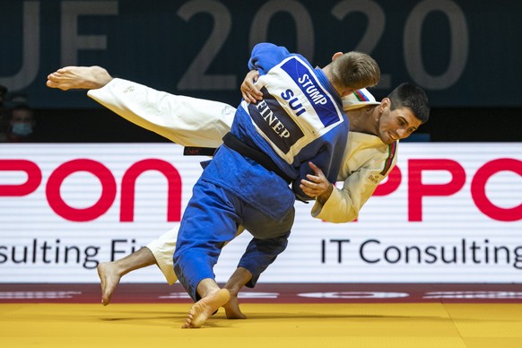 epa08831645 Nils Stump of Switzerland (blue) and Rustam Orujov of Azerbaijan (white) in action during the bronze medal bout in the men&#039;s -73kg category at the European Judo Championships in Pragu ...