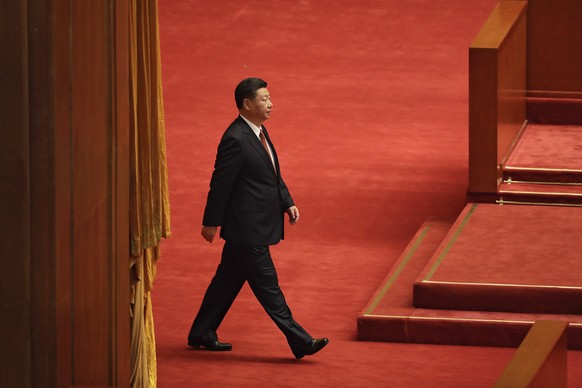 epa06119357 Chinese President Xi Jinping arrives at a ceremony held to commemorate the 90th anniversary of the founding of the People's Liberation Army at the Great Hall of the People in Beijing, Chin ...