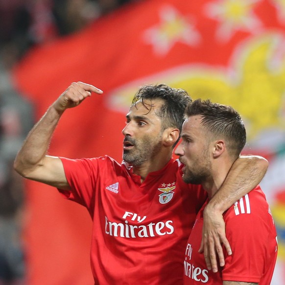 epa07183510 Benfica´s player Jonas (L) and Haris Seferovic celebrate the scoring of a goal against Arouca during the Portugal Cup soccer match at Luz Stadium in Lisbon, Portugal, 22 November 2018. EPA ...