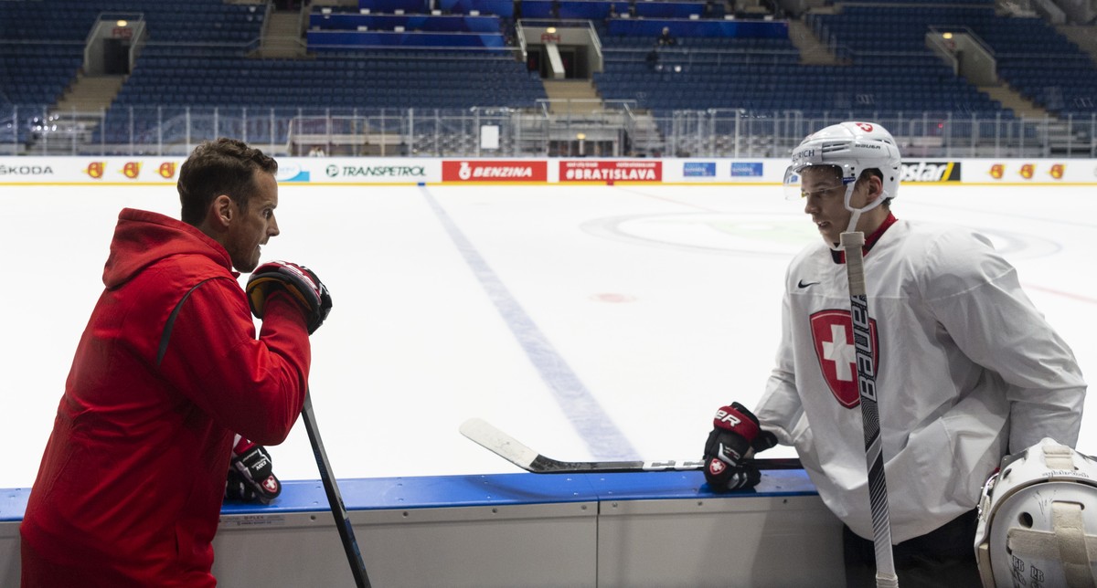 Switzerland's coach Patrick Fischer and Switzerland's Philipp Kurashev during a training session of the Swiss team at the IIHF 2019 World Ice Hockey Championships, at the Ondrej Nepela Arena ...