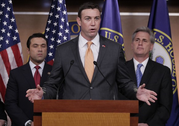 FILE - In this April 7, 2011 file photo, U.S. Rep. Duncan Hunter, R-Calif., center, speaks during a news conference on Capitol Hill. A federal grand jury in California on Tuesday, Aug. 21, 2018, has i ...