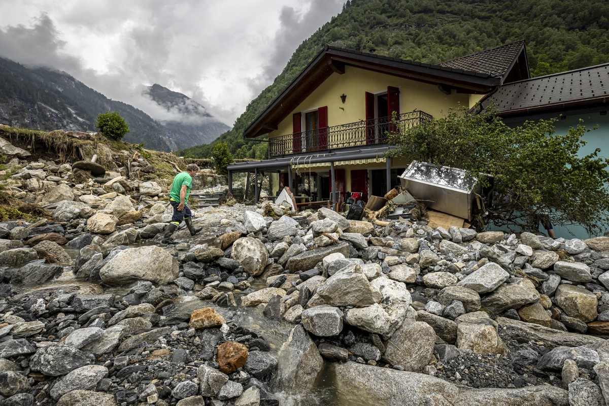 Elio Biadici on his way to his devastated house in Piano di Peccia, in the Maggia Valley, southern Switzerland on Wednesday July, 4, 2024. During the storm on Saturday night, Elio Biadici and his wife ...