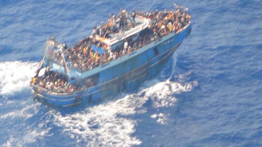 epa10691107 A handout photo made available by the Hellenic Coast Guard on 14 June 2023 shows a fishing vessel carrying a large number of migrants sailing in international waters, near western Peloponn ...