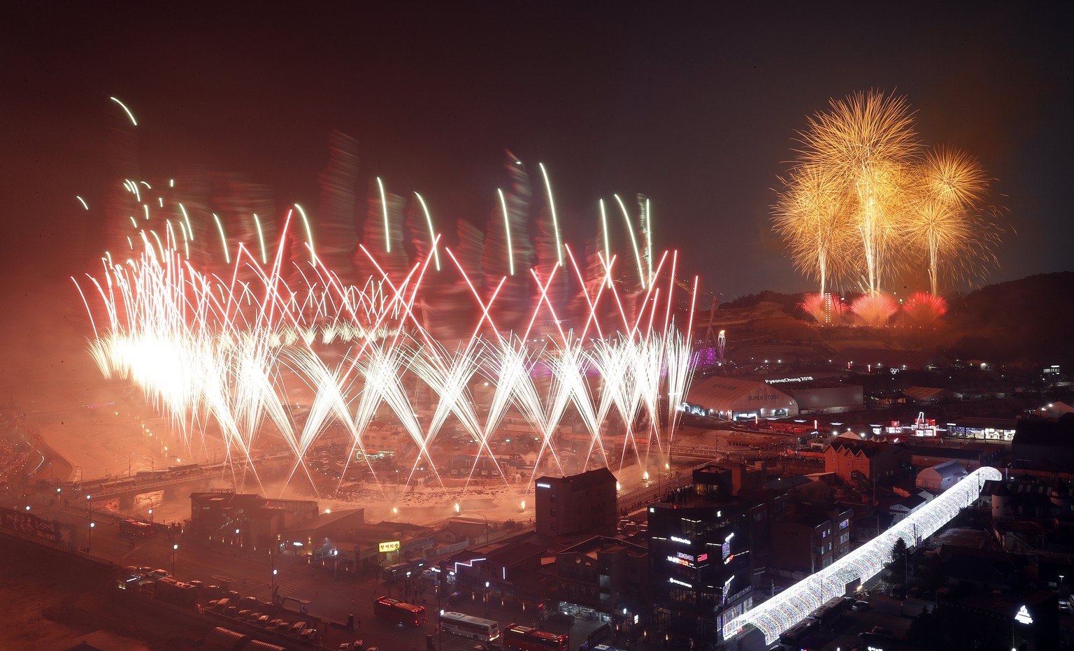 epa06508829 Fireworks go off at the end of the Opening Ceremony of the PyeongChang 2018 Olympic Games at the Olympic Stadium, Pyeongchang county, South Korea, 09 February 2018. EPA/JEON HEON-KYUN