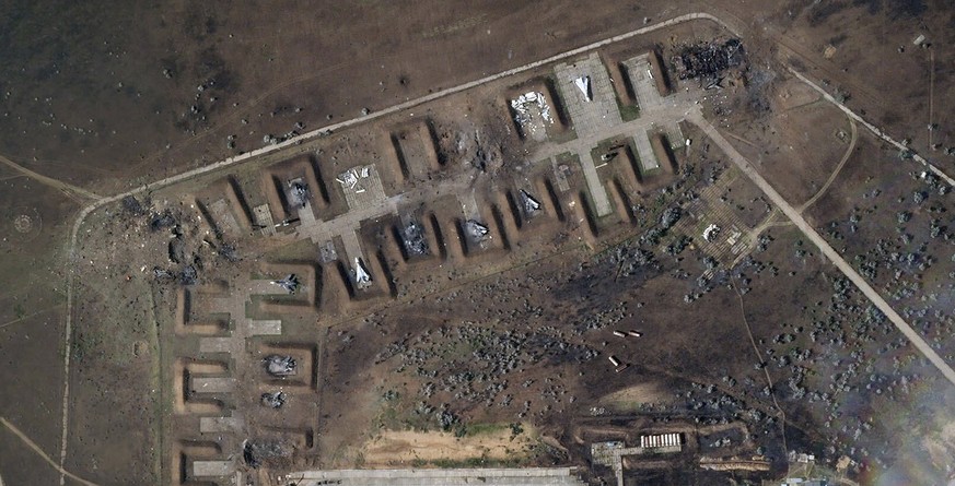 This satellite image provided by Planet Labs PBC shows destroyed Russian aircraft at Saki Air Base after an explosion Tuesday, Aug. 9, 2022, in the Crimean Peninsula, the Black Sea peninsula seized fr ...
