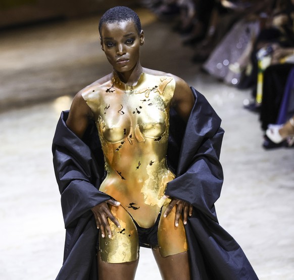 epa12225575 A model presents a creation from the Haute Couture Autumn/Winter 2025/2026 collection by Lebanese designer Robert Adi Nader during Paris Fashion Week, in Paris, France, 08 July 2025. The p ...