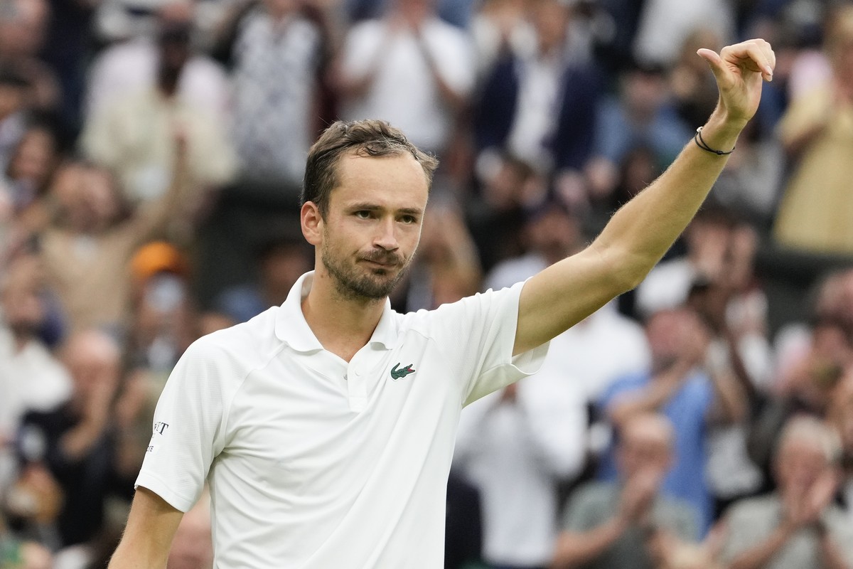 Daniil Medvedev of Russia celebrates after defeating Jannik Sinner of Italy in their quarterfinal match at the Wimbledon tennis championships in London, Tuesday, July 9, 2024. (AP Photo/Alberto Pezzal ...
