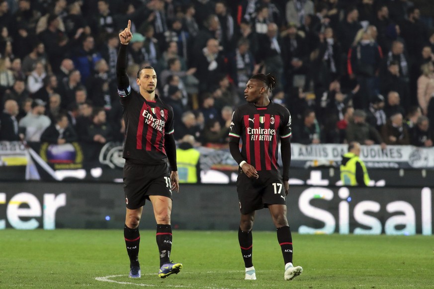Milan&#039;s Zlatan Ibrahimovic, left, celebrates after scoring to 1-1 during the Serie A soccer match between Udinese Calcio and AC Milan at the Friuli stadium in Udine, Italy, Saturday March 18, 202 ...