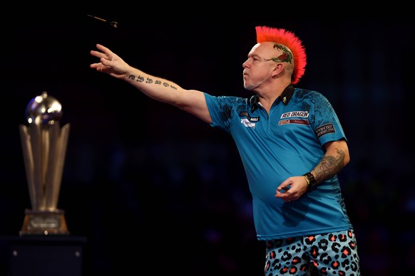 IMAGO / Action Plus

3rd January 2022: Alexandra Palace, London, England: The William Hill World Darts Tournament final between Peter Wright and Michael Smith; Peter Wright in action during his match  ...