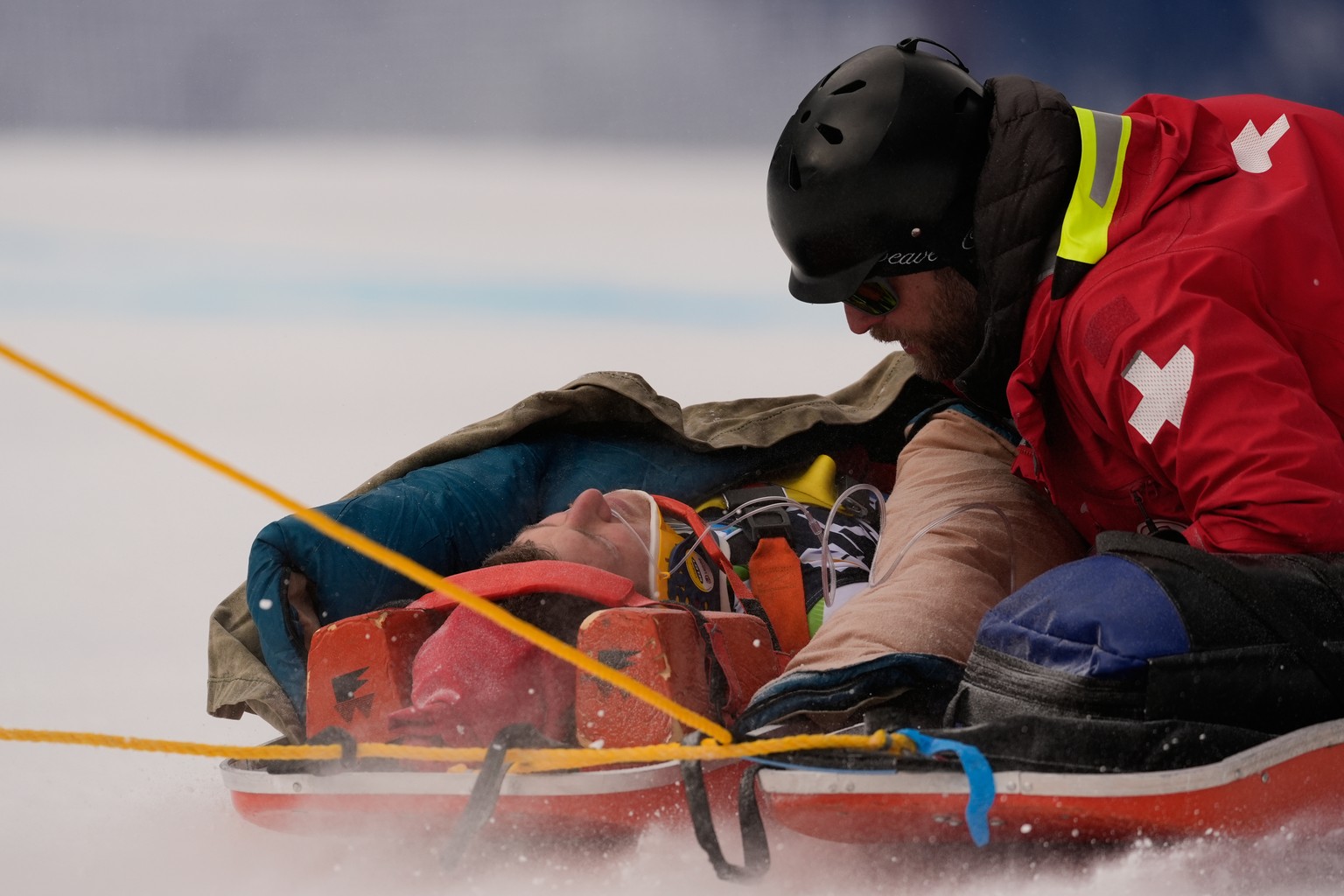 Slovenia&#039;s Rok Elezi Aznoh is brought down on a sled after a crash while competing during a World Cup men&#039;s downhill skiing race, Thursday, Dec. 4, 2025, in Beaver Creek, Colo. (AP Photo/Rob ...