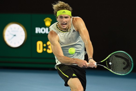 epa09015706 Alexander Zverev of Germany in action during his Men&#039;s Quarter finals singles match against Novak Djokovic of Serbia on Day 9 of the Australian Open at Melbourne Park in Melbourne, Au ...