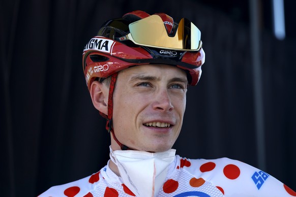 epa13106809 Polka Dot Jersey best climber Danish cyclist Jonas Vingegaard of Team Visma | Lease a Bike looks on during the sign-on podium ahead of Stage 9 of the Tour de France, a 154.6 km route from  ...