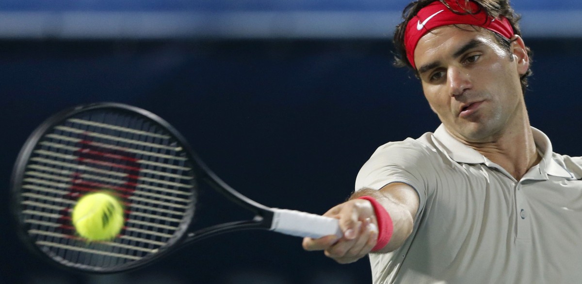 Federer in Aktion gegen Lukas Rosol.&nbsp;