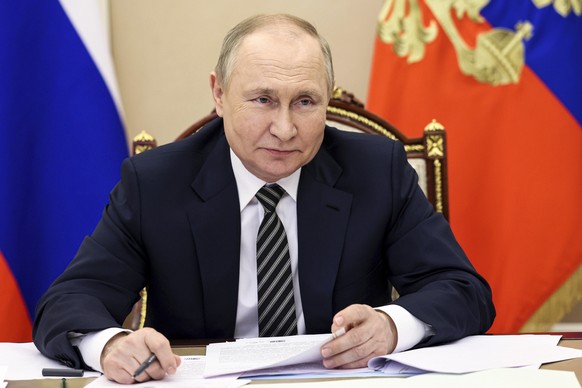 Russian President Vladimir Putin attends a meeting via videoconference in Moscow, Russia, Friday, May 27, 2022. (Mikhail Metzel, Sputnik, Kremlin Pool Photo via AP)
Vladimir Putin