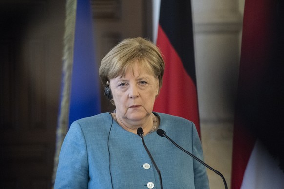 epa06829798 German Chancellor Angela Merkel delivers a press statement with Lebanese Prime Minister Saad Hariri (unseen) at the government palace in Beirut, Lebanon, 22 June 2018. Angela Merkel is on  ...