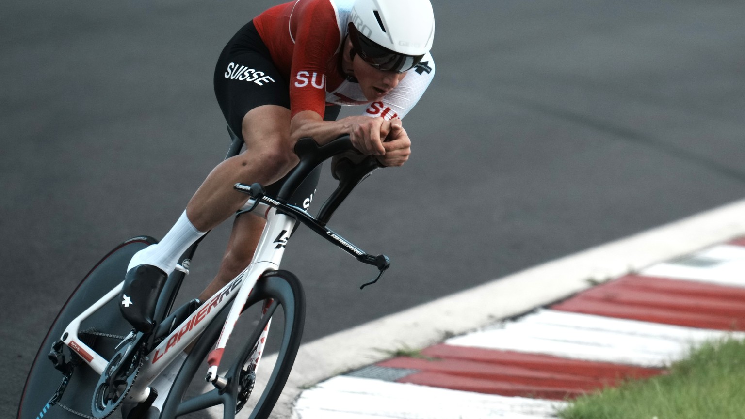 Stefan Kueng of Switzerland competes during the men&#039;s cycling individual time trial at the 2020 Summer Olympics, Wednesday, July 28, 2021, in Oyama, Japan. (AP Photo/Thibault Camus)