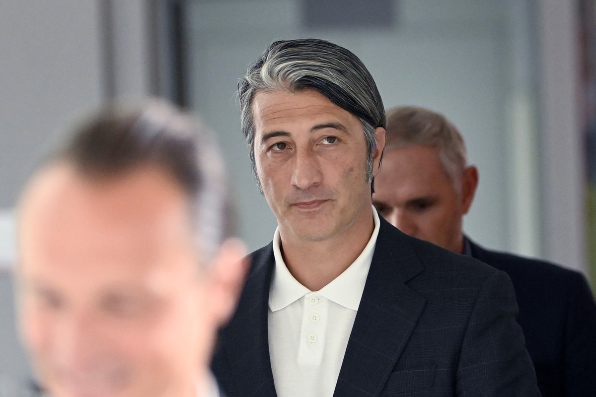 epa09407300 Swiss soccer coach Murat Yakin arrives to a press conference where he is presented as the new coach of Switzerland's national team in Muri, Switzerland, 09 August 2021. EPA/Alessandro ...