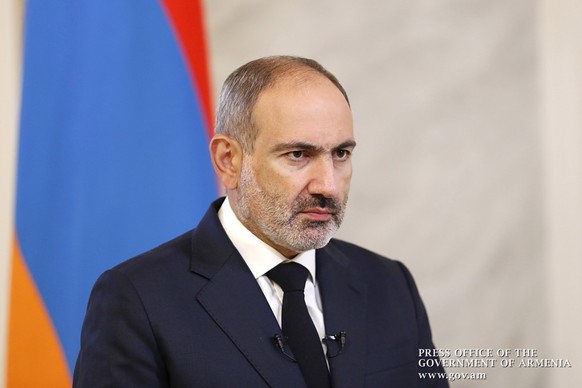 epa08717934 A handout photo made available by the Armenian Government Press Office shows Armenian Prime Minister Nikol Pashinyan holds a televised address to the nation in Yerevan, Armenia, 03 October ...