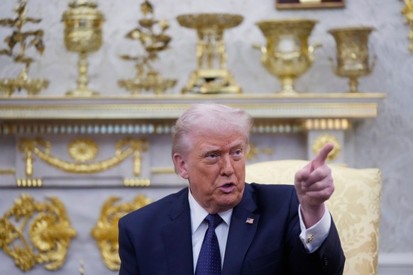 President Donald Trump speaks during a meeting with German Chancellor Friedrich Merz in the Oval Office at the White House, Tuesday, March 3, 2026, in Washington. (AP Photo/Mark Schiefelbein)
Donald T ...