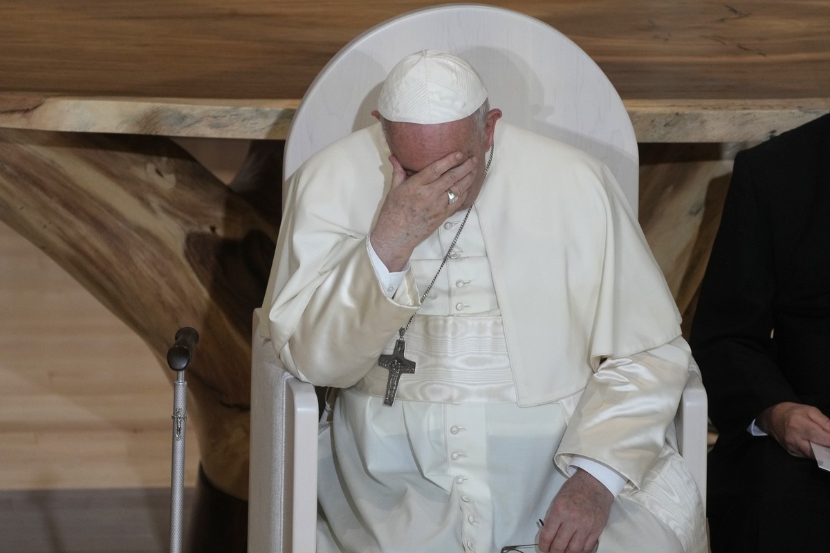 Pope Francis sits during a meeting with Indigenous peoples and members of the parish community of Sacred Heart in Edmonton, Canada, Monday, July 25, 2022. Pope Francis begins a "penitential" ...