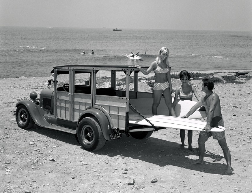 UNITED STATES - JULY 25: Merle Smith - Model A Woody - Beach - Surf Boards (Photo by Eric Rickman/The Enthusiast Network via Getty Images/Getty Images)
