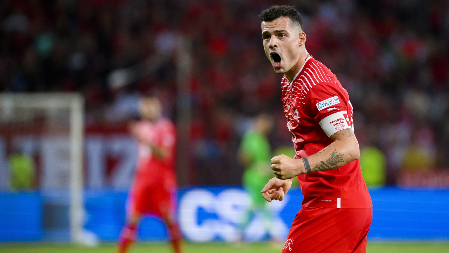 Switzerland&#039;s midfielder Granit Xhaka celebrates during the UEFA Nations League group A2 soccer match between Switzerland and Portugal at the Stade de Geneve stadium, in Geneva, Switzerland, Sund ...