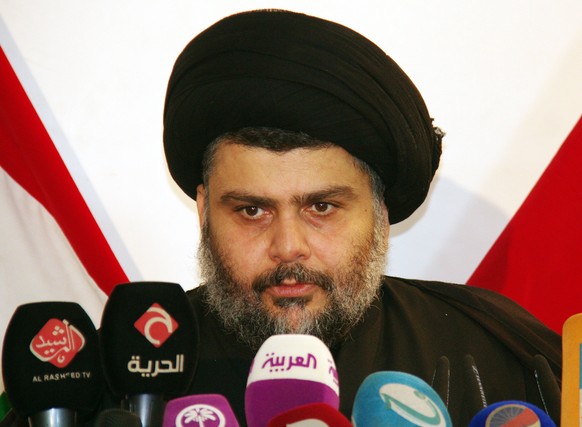 epa10145384 (FILE) - Moqtada al-Sadr, the leader of Iraq&#039;s Sadrist movement speaks during a press conference at his office in Najaf, Iraq, 01 January 2013 (reissued 29 August 2022). Moqtada al-Sa ...