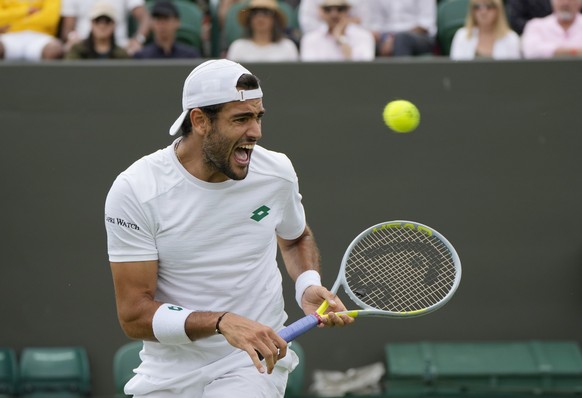 Italy&#039;s Matteo Berrettini reacts between points during the men&#039;s singles second round match against Botic Van De Zandschulp of the Netherlands on day four of the Wimbledon Tennis Championshi ...