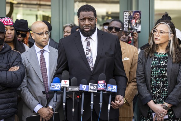 Flanked by family members, attorneys and supporters, Dexter Reed&#039;s father, Dexter Reed Sr., speaks to reporters outside the headquarters for the Civilian Office of Police Accountability in West T ...