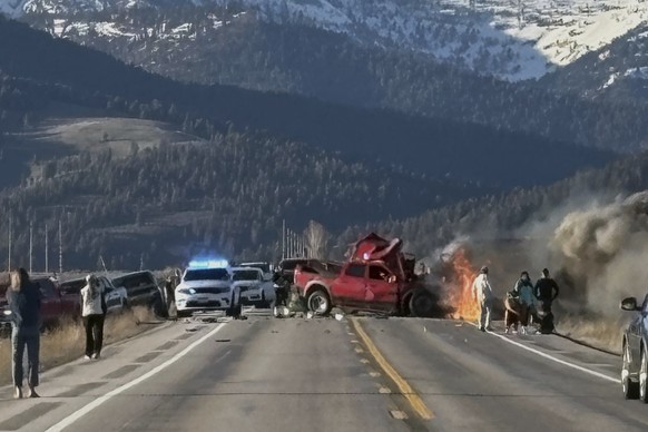 Rescue workers arrive to the scene after a deadly collision between a pickup truck and tour van near Henry?s Lake State Park in eastern Idaho on Thursday, May 1, 2025. (Roger Merrill via AP)
APTOPIX Y ...
