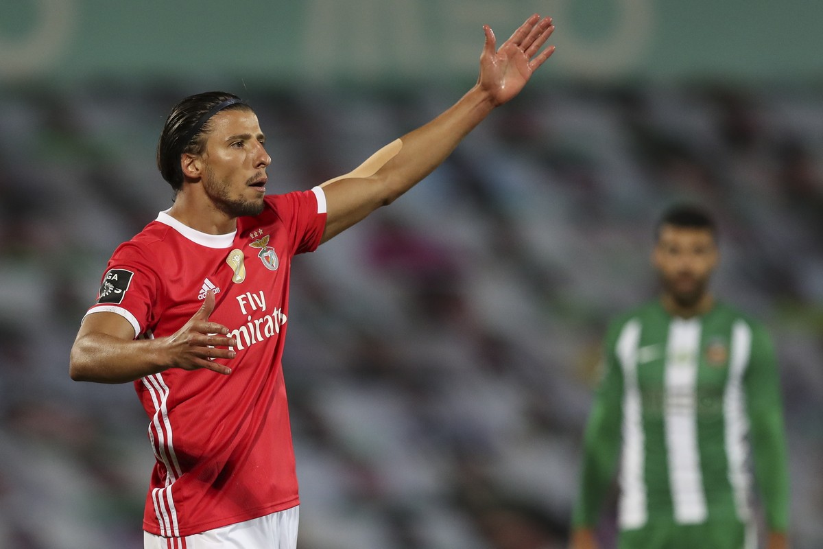 epa08492428 Benfica's Ruben Dias reacts during the Portuguese First League soccer match between Rio Ave and Benfica, held at Arcos stadium, in Vila do Conde, Portugal, 17 June 2020. EPA/JOSE COEL ...