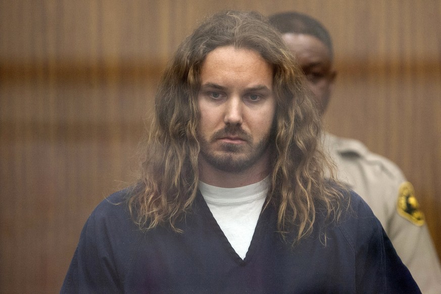 FILE - In this May 9, 2013 file pool photo, Tim Lambesis, singer for the Christian-inspired heavy metal group As I Lay Dying, appears in Vista Superior Court in Vista, Calif. Lambesis, convicted in a  ...