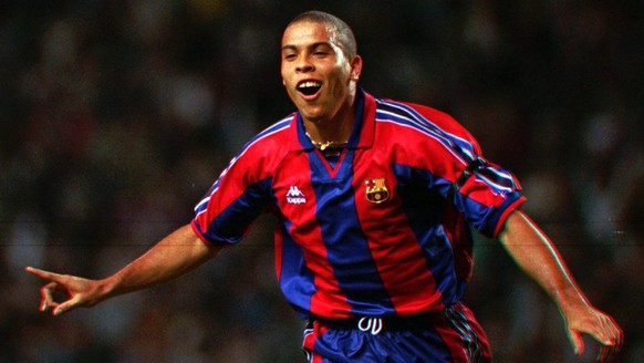 FILE - In this Sept. 12, 1996, file photo, F.C. Barcelona&#039;s Brazilian striker Ronaldo celebrates after scoring a goal during a Cup Winner&#039;s Cup 1st. round 1st leg soccer match against AEK La ...