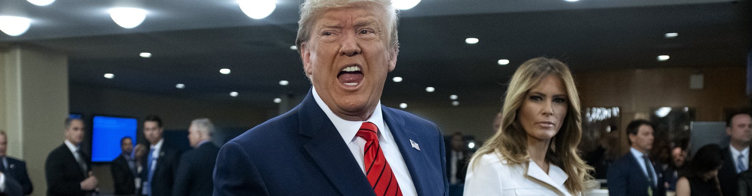 U.S. President Donald Trump addresses reporters as he arrives with first lady Melania Trump for the 74th session of the United Nations General Assembly, at U.N. headquarters, Tuesday, Sept. 24, 2019.  ...