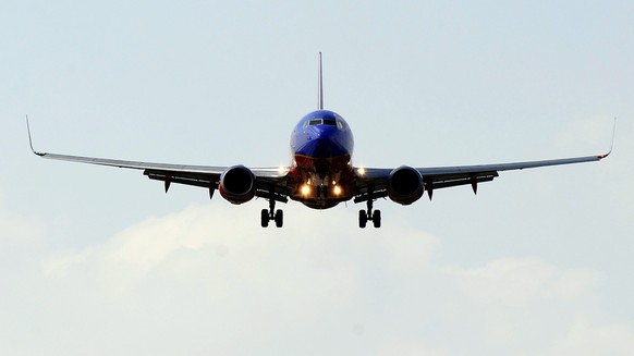 epa02666772 A Southwest Airlines plane comes in for a landing at Love Field in Dallas, Texas USA, 02 April 2011. Media reports state that Southwest Airlines announced it was canceling hundreds of flig ...