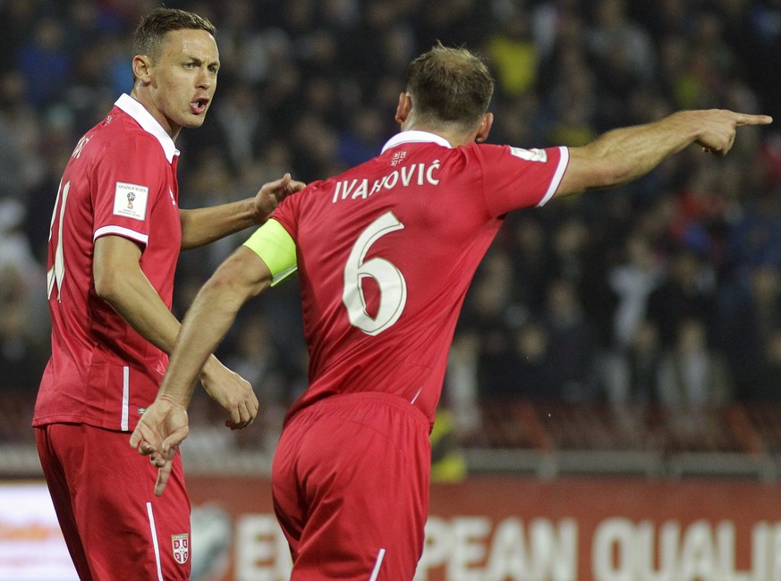 epa06255193 Nemanja Matic (L) and Branislav Ivanovic (R) of Serbia react during the FIFA World Cup 2018 Group D qualifying soccer match between Serbia and Georgia in Belgrade, Serbia, 09 October 2017. ...