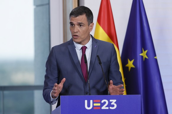 epa10724156 Spanish Prime Minister Pedro Sanchez and the European Commission President Von der Leyen (not pictured) address a press conference at the Museum of Royal Collections during a meeting of th ...