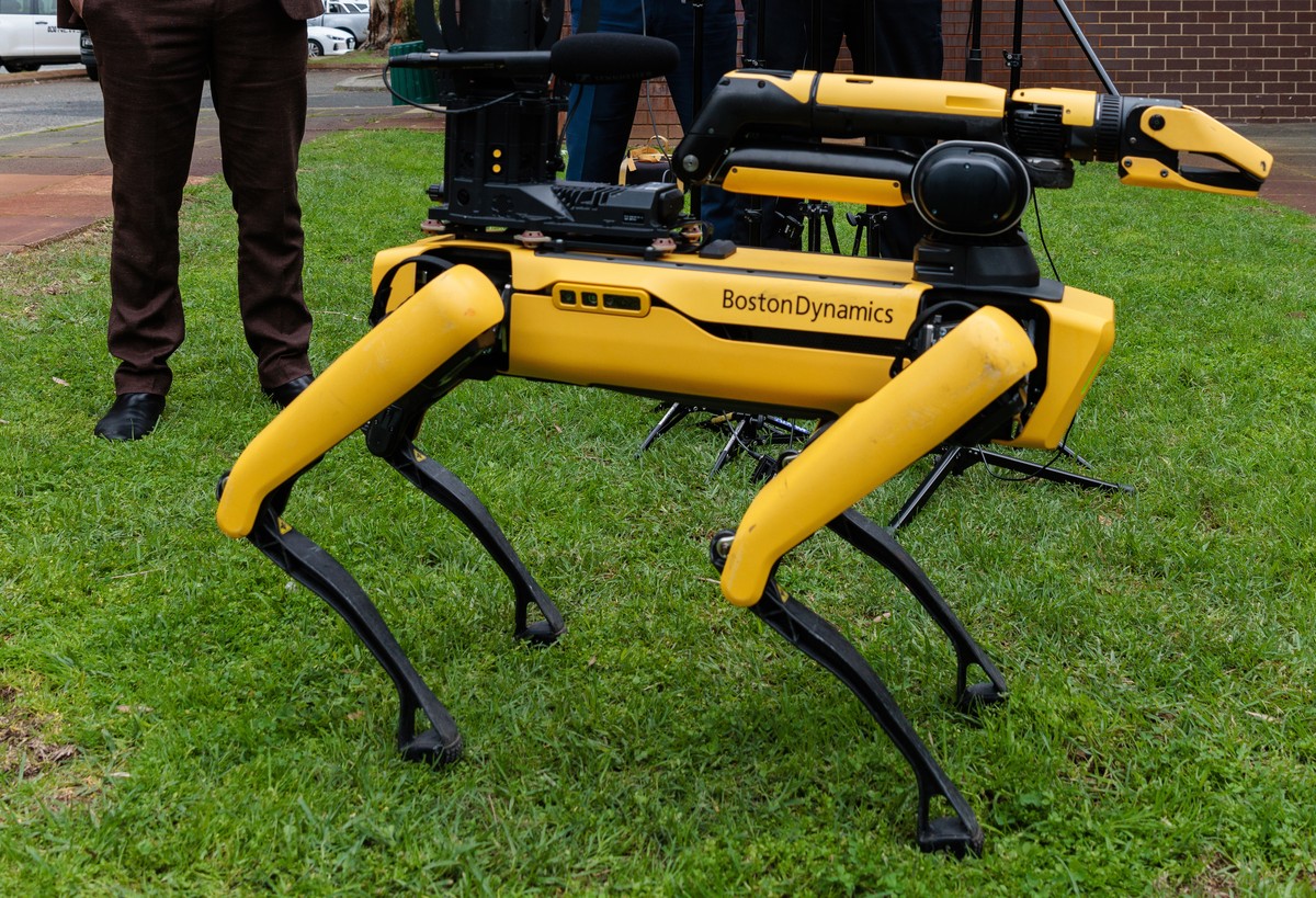 epa10092067 WA Police Commissioner Col Blanch and WA Minister for Police, Paul Papalia attend a press conference with 'Spot' the robot, a multi-purpose robotics platform to be used by the WA ...