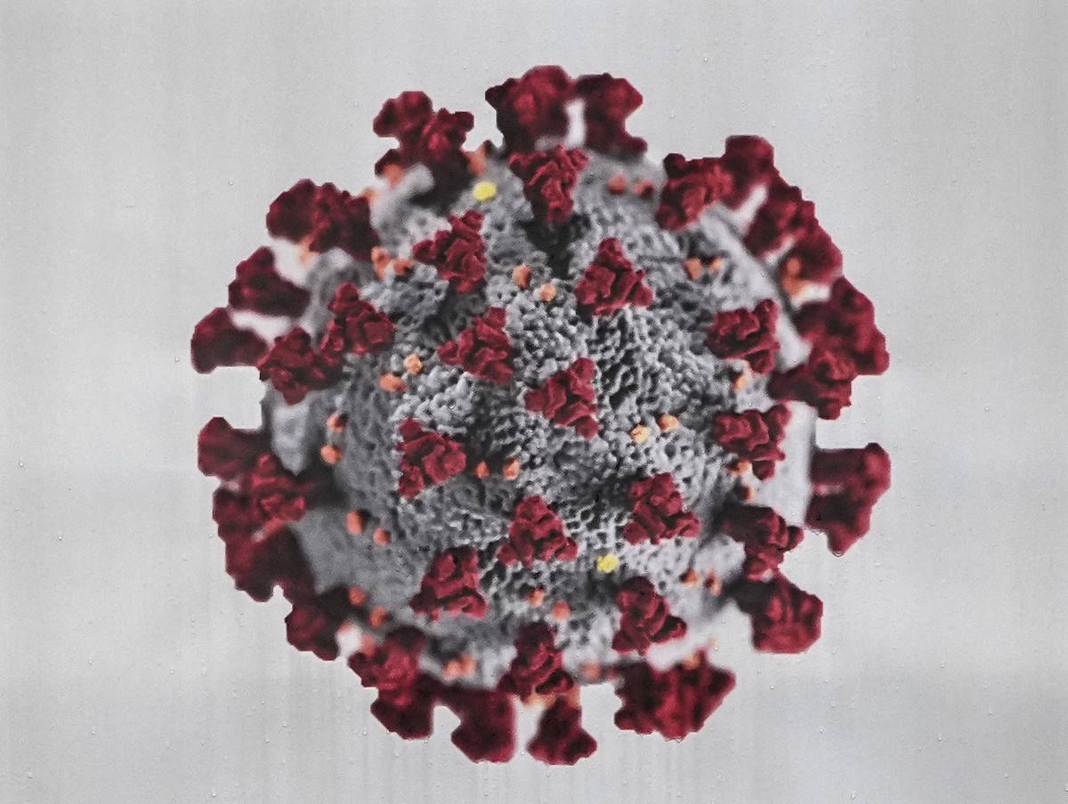 A woman passes a coronavirus test center in Duisburg, Germany, Tuesday, Oct. 12, 2021. Germany ended free rapid corona tests for all this week. Tests remain free only for some groups, like young child ...