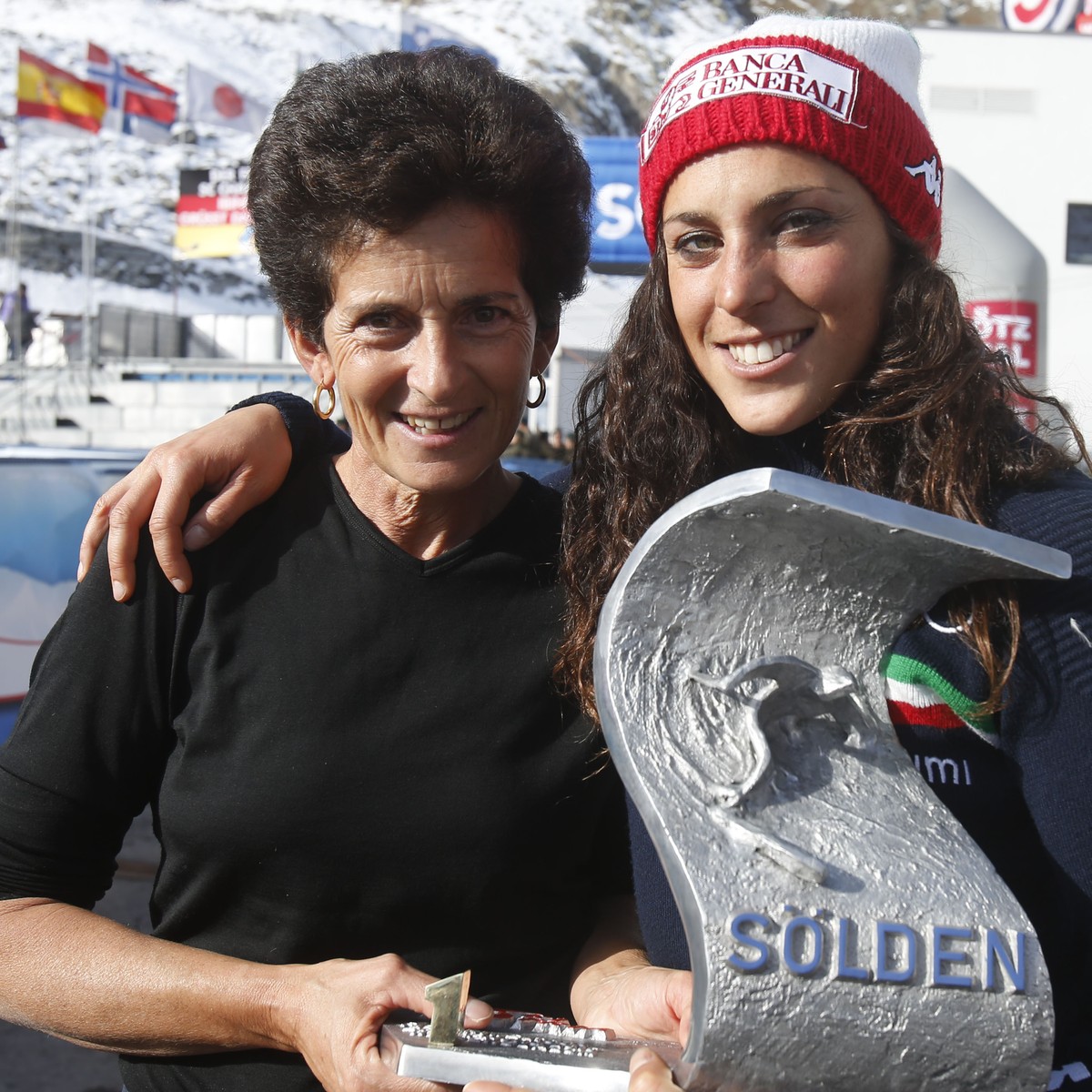 Italy's Federica Brignone poses with her mother Maria Rosa Quario after winning a Ski World Cup women's Giant Slalom in Soelden, Austria, Saturday, Oct. 24, 2015. (AP Photo/Marco Trovati)