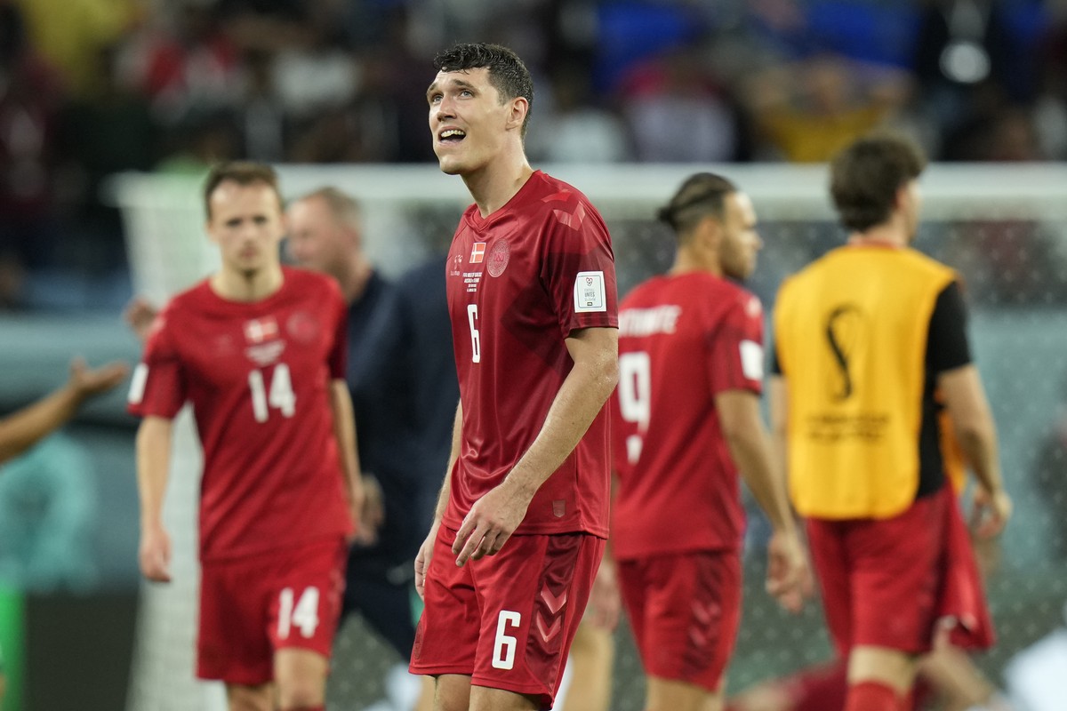 Denmark's Andreas Christensen walks in dejection at the end of the World Cup group D soccer match between Australia and Denmark, at the Al Janoub Stadium in Al Wakrah, Qatar, Wednesday, Nov. 30,  ...