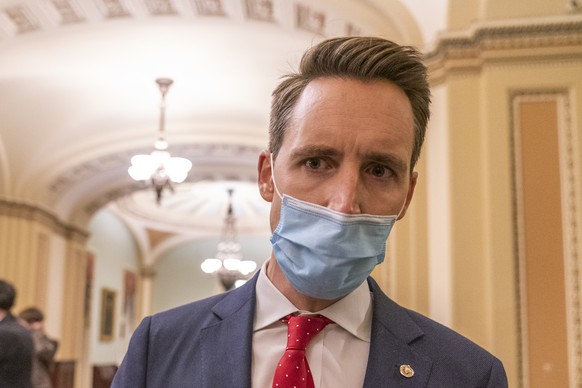 Sen. Josh Hawley, R-Mo., speaks to reporters as he returns to the Senate Chamber at the Capitol, early Thursday, Jan. 7, 2021, in Washington. (AP Photo/Manuel Balce Ceneta)
Josh Hawley